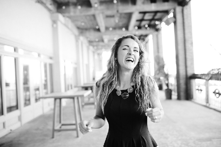 Kaitlyn laughing at Asbury Park for Jersey Shore Senior Photos by Kasey Ivan Photography