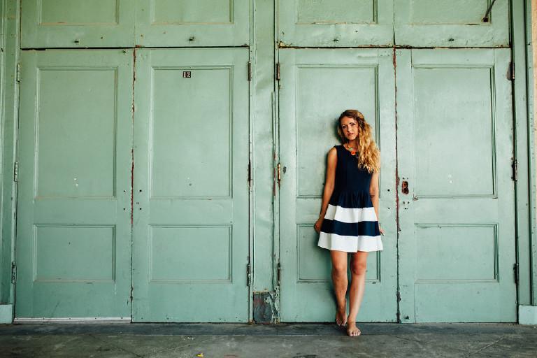 cool old doors for senior photo pose by Kasey Ivan Photography