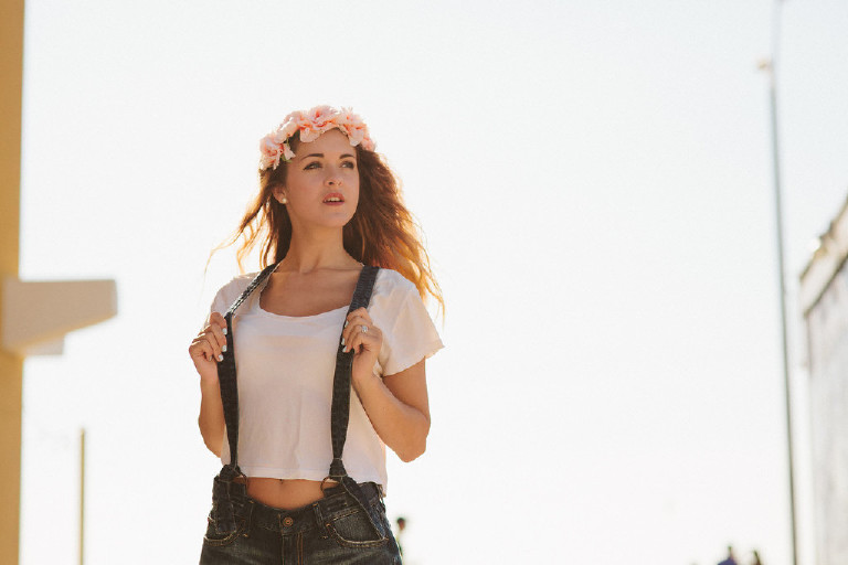 flower crown and overalls senior pictures pose on jersey shore by Kasey Ivan Photography