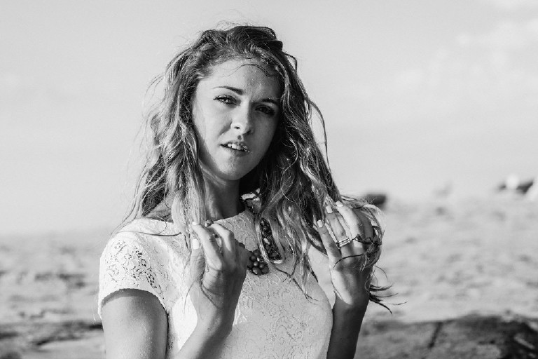 Kaitlyn posing fashion forward at Asbury Park Beach for unique Jersey Shore Senior Photos