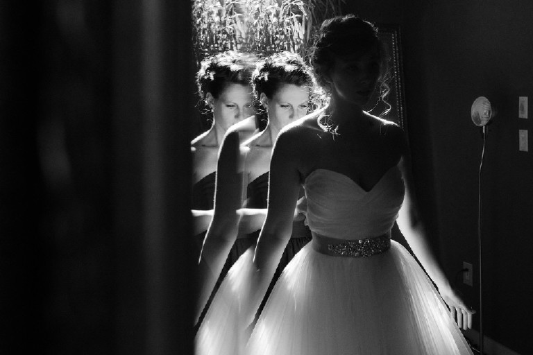 unique relection of bride in mirror at Chimney Hill Estate wedding in Lambertville NJ