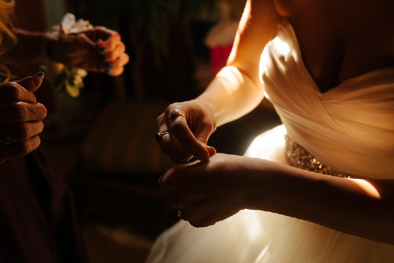 sharing the family ring at Chimney Hill Estate wedding in Lambertville NJ