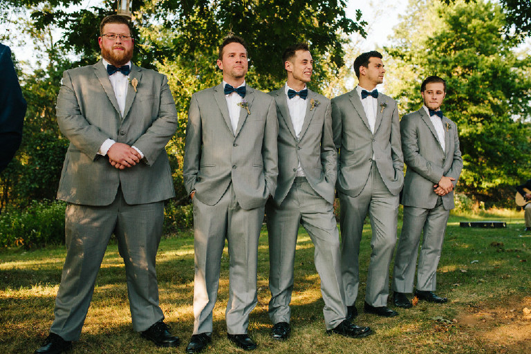 groomsmen in a row at Chimney Hill Estate wedding ceremony in Lambertville NJ