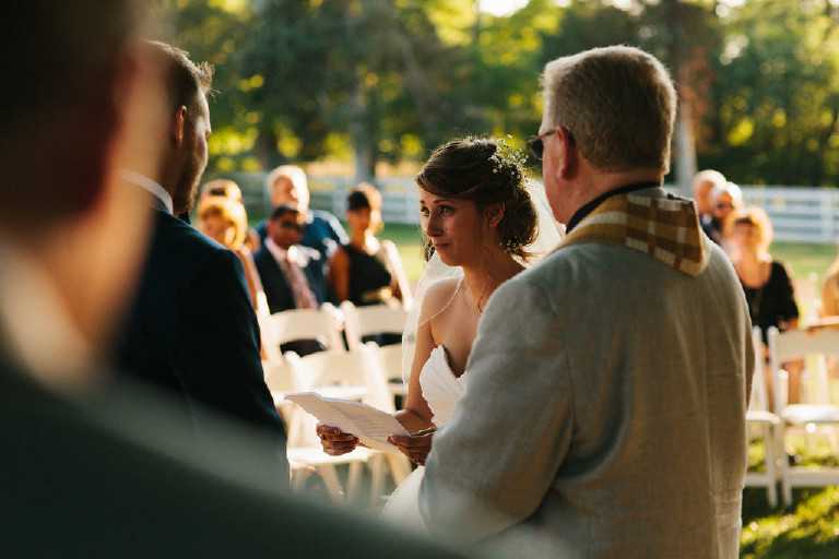 bride crying while reciting vows during Chimney Hill Estate wedding ceremony in Lambertville NJ by Kasey Ivan Photography