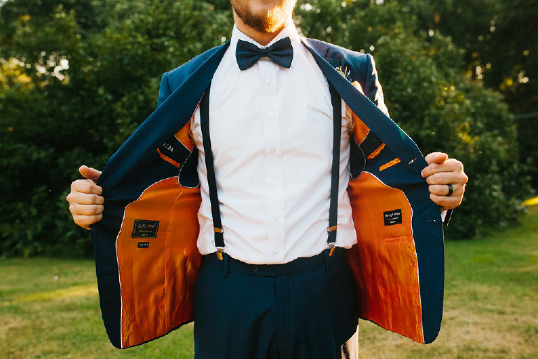 inside of blue suit jacket at Chimney Hill Estate wedding in Lambertville