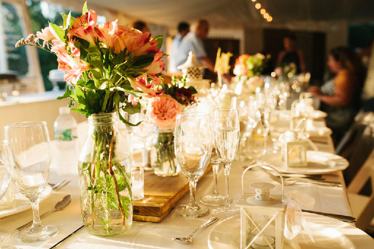 row of rustic glasses and flowers at Chimney Hill Estate wedding reception in Lambertville by Kasey Ivan Photography