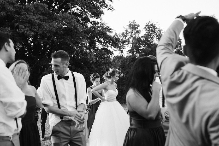 intimate shot of bride through the crowd at Chimney Hill Estate wedding reception in Lambertville by Kasey Ivan Photography