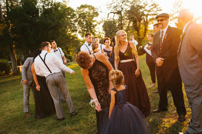 guest mingle at sunset at Chimney Hill Estate wedding reception in Lambertville by Kasey Ivan Photography