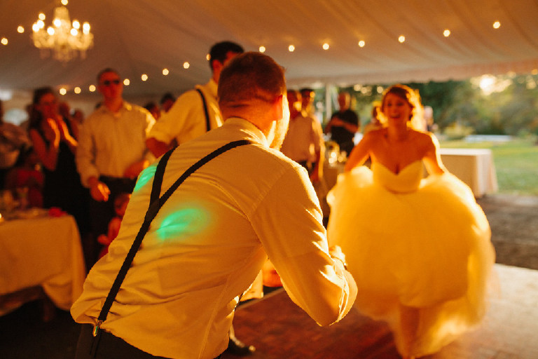 bride prepares to jump at Chimney Hill Estate wedding reception in Lambertville by Kasey Ivan Photography