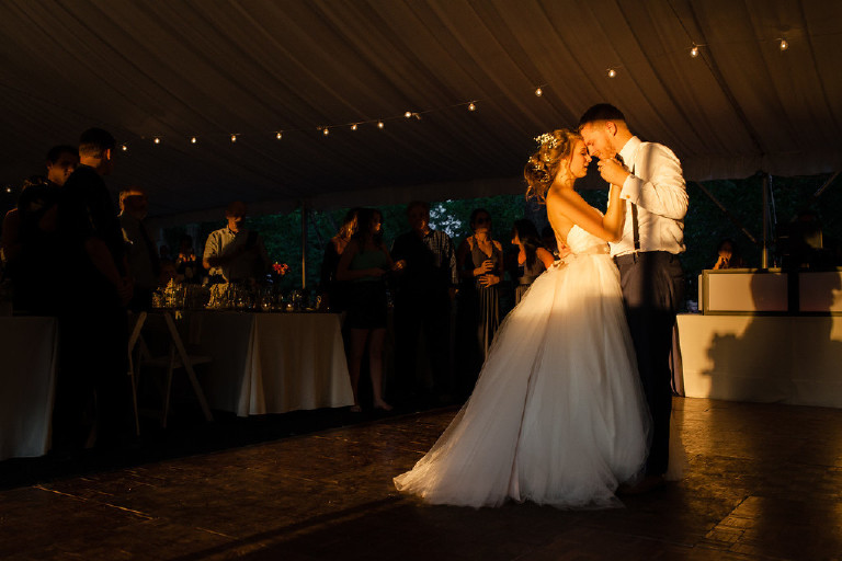 first dance under canopy tent during sunset at Chimney Hill Estate wedding reception by Kasey Ivan Photography