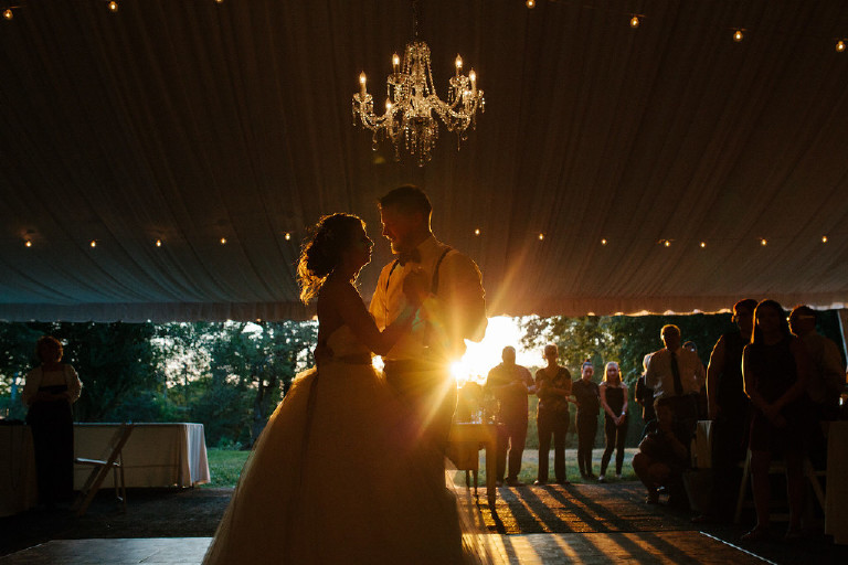 first dance under canopy tent during sunset at Chimney Hill Estate wedding reception by Kasey Ivan Photography