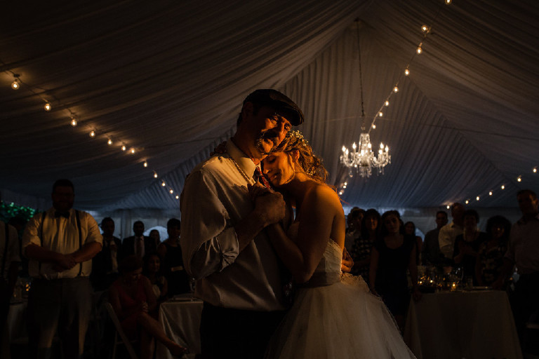 father daughter first dance under canopy tent during sunset at Chimney Hill Estate wedding reception by Kasey Ivan Photography