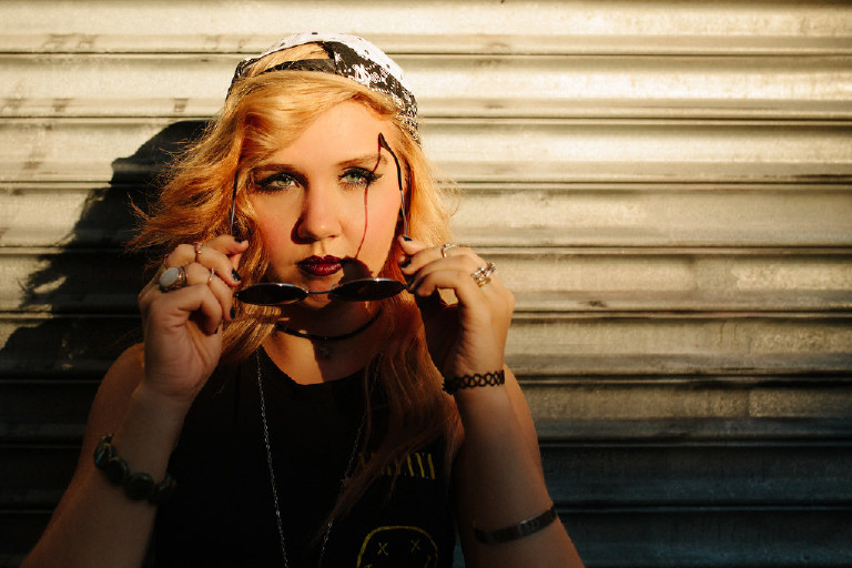 perfect lighting on eyes in downtown Philadelphia for senior photos by Kasey Ivan Photography