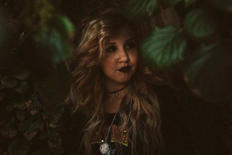 film noir look in the ivy in downtown Philadelphia for senior photos by Kasey Ivan Photography