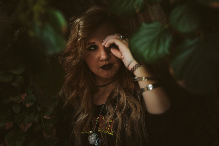film noir girl in downtown Philadelphia for senior photos by Kasey Ivan Photography