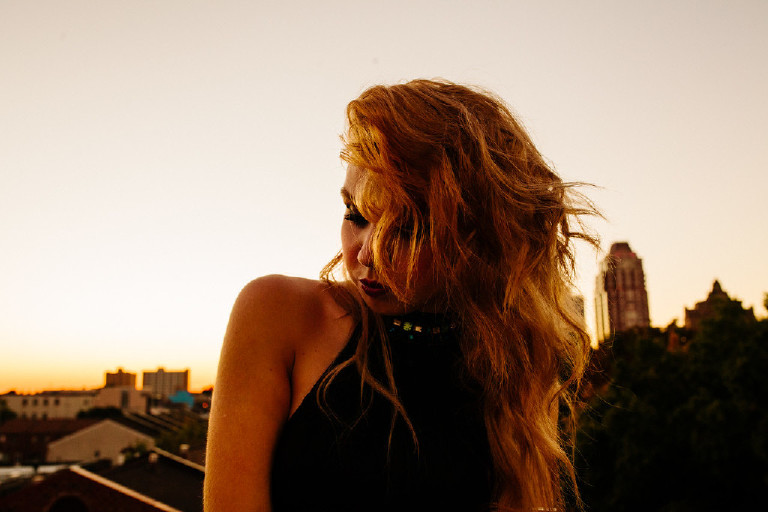 emotional sunset rooftop senior photos in downtown south street philadelphia by Kasey Ivan Photography