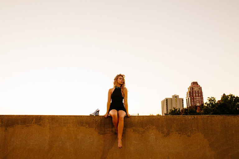 unique perspective and big sky rooftop senior photos in downtown south street philadelphia by Kasey Ivan Photography