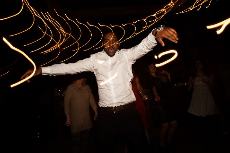 dancing light trails at wedding reception in poconos by Kasey Ivan Photography