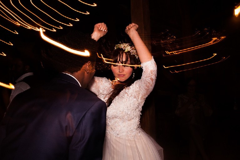 dancing light trails at wedding reception in poconos by Kasey Ivan Photography