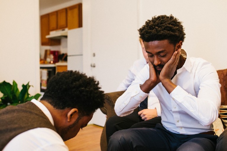 Glad the groom getting ready before rustic ethiopian barn wedding in the poconos