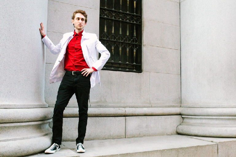 male model posing for fashion editorial in center city Philadelphia by Kasey Ivan Photography