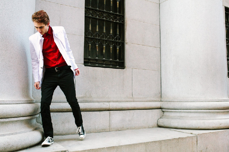 male model posing for fashion editorial in center city Philadelphia by Kasey Ivan Photography