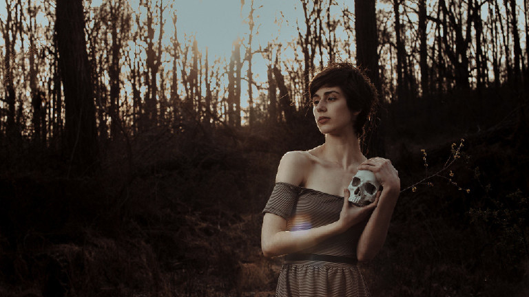 Nicole Ruzicka wearing a crown of thorns at Goat Hill Overlook outside Lambertville New Jersey by Portrait and Fine Art Photographer Kasey Ivan
