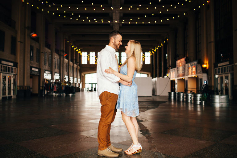 groom holding bride inside asbury park for engagement photos by Kasey Ivan Photography