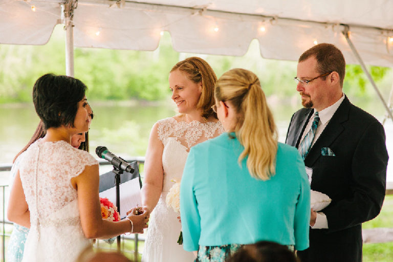 presenting the brides with the las arras arrhae at a Pinoy wedding on the Delaware River