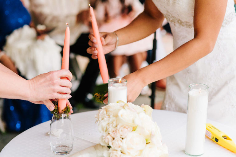 brides light pink unity candles at small intimate Pinoy wedding ceremony outside New Hope PA