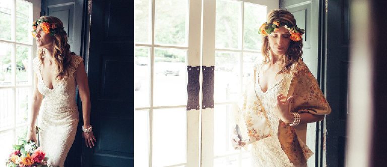 bride in a flower crown stands in a doorway inside the entrance to the Black Bass Hotel near New Hope PA by Kasey Ivan Photography