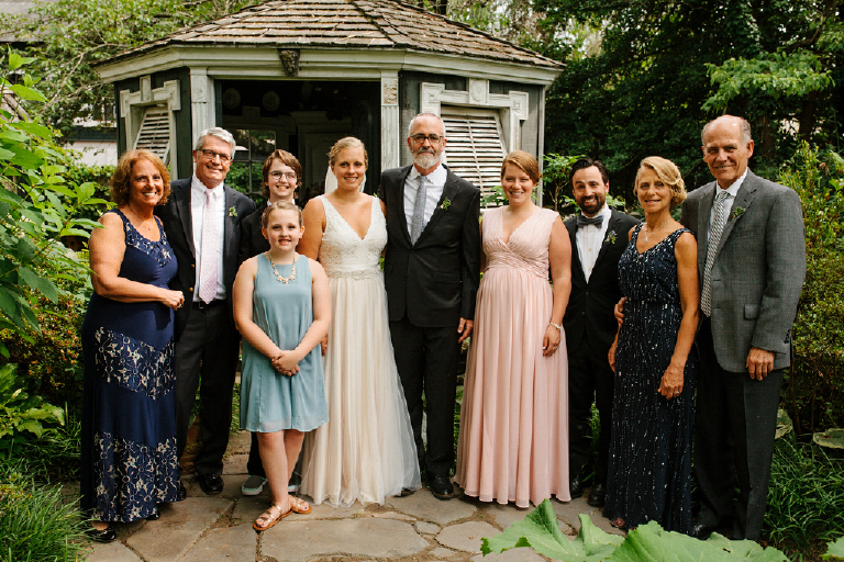 Group family picture in a garden at the Porches on the Towpath in New Hope and Lambertville