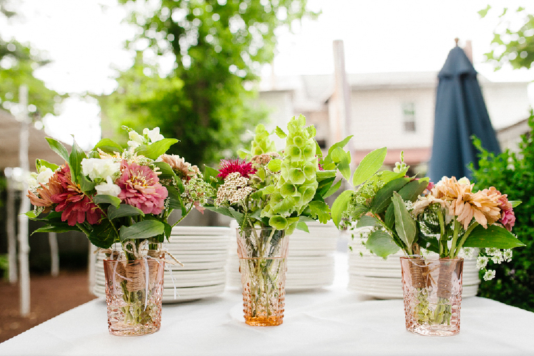 Picture of small bouquets of colorful flowers sitting on a table at Hamiltons Grill Room Lambertville