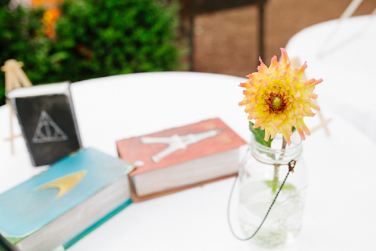 Picture of a single flower in a mason jar sitting on a table for a wedding at Hamiltons Grill Room Lambertville