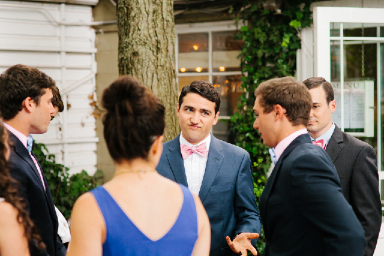 Picture of a wedding guest in a blue suit making a funny face waiting for a wedding at Hamiltons Grill Room Lambertville