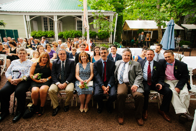 Group Photo of wedding guests sitting together at a wedding at Hamiltons Grill Room Lambertville