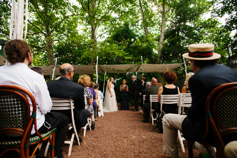 Wedding photography down the aisle at he alter where a bride and groom stand Hamilton's Grillroom Lambertville New Hope