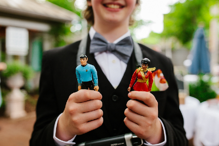 young girl holding startrek character action figures at a wedding Hamilton's Grillroom Lambertville New Hope