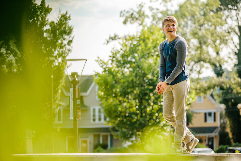 Tyler McClellan laughs during his senior portraits session in Doylestown PA