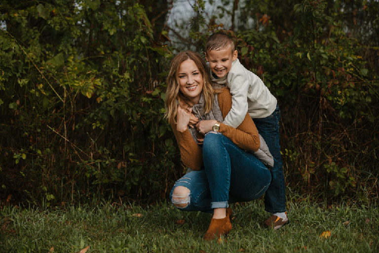 little boy hugging his mom for family portrait by New Hope photographer Kasey Ivan