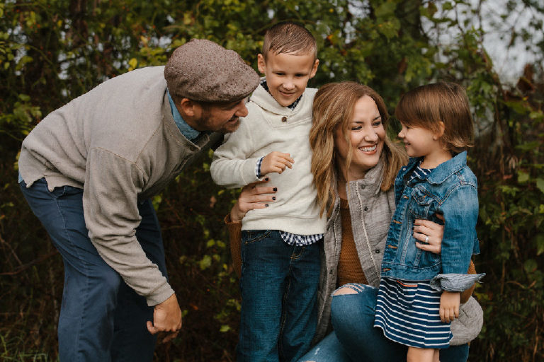 family all together smiling for family portrait by New Hope photographer Kasey Ivan