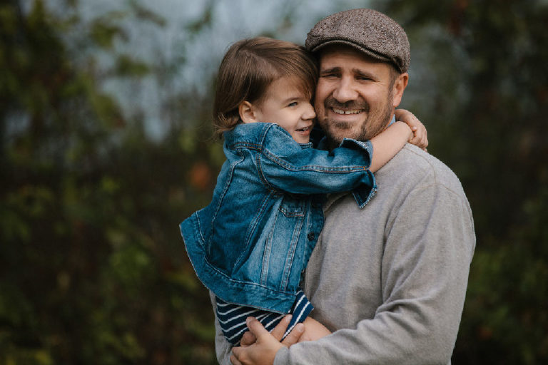 english father hugging daughter in foggy morning for family portrait by New Hope photographer Kasey Ivan